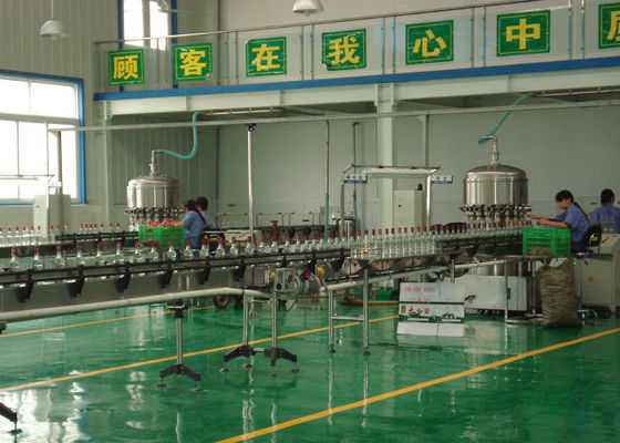 Китай Разлитые по бутылкам системы транспортера производственной линии водки/вискиа/ликера/вина упаковывая поставщик